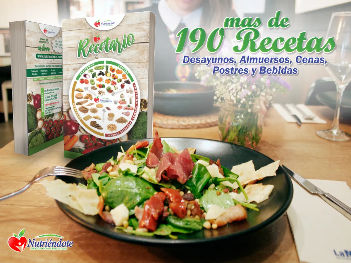 Recetario Nutriéndote con más de 190 recetas sobre una mesa servida